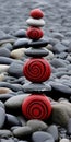 AI generated illustration of a smooth stack of various rocks with some red spiral rocks