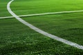 AI generated illustration of a soccer field lines painted on grass outside stadium