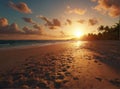 an image of the sun setting over a beach with footprints in the sand Royalty Free Stock Photo