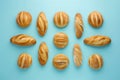 some loaves bread on blue background on the table top view Royalty Free Stock Photo