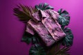 AI generated illustration of a tropical shirt on a vibrant purple background with fern branches