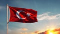 AI generated illustration of the Turkish flag fluttering in the wind, illuminated by the sunset Royalty Free Stock Photo