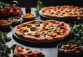 Two pizzas of different varieties laid out on a table