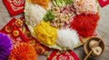 chinese new year dishes on display in red and gold paper