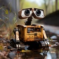 a wall e robot is on the ground by some water