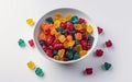 AI generated illustration of a white plate with a variety of brightly colored gummy bears