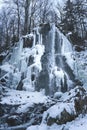 a waterfall has many ice on it while winter is in the air Royalty Free Stock Photo