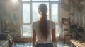 AI generated illustration of a young woman gazing out window in sunlit empty room Royalty Free Stock Photo