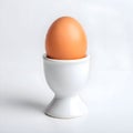 AI-Generated Image: Brown Egg in a White Egg Cup Royalty Free Stock Photo