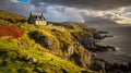 Irish Coastal Serenity: Cottage, Cliff, and a Vibrant Rainbow Royalty Free Stock Photo