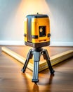Yellow Laser Tool on Tripod with Soft Shadows Royalty Free Stock Photo