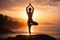 Balanced Tree Pose Yoga At Sunset On Coastal Rock With Serene Ocean View Royalty Free Stock Photo