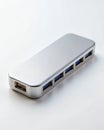 Angled View of Sleek USB Hub on White Background Royalty Free Stock Photo