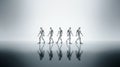 group of walking chrome humanoid robots on a plain background