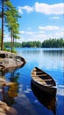 The image is of a wooden rowboat on a calm lake surrounded by green trees and blue sky Royalty Free Stock Photo