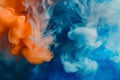 Infrared shot of the abstract blue and orange fluffy pastel ink smoke cloud in water Royalty Free Stock Photo