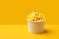 Mac and Cheese tasty fast food street food for take away on yellow background