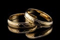 Sacrament: Matrimony. Wedding rings on a black background