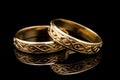 Sacrament: Matrimony. Wedding rings on a black background