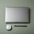 AI-Generated Image of a Silver Laptop, White Mouse, and Gray Pen on a Light Green Surface Royalty Free Stock Photo