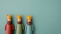 Three kings standing on turquoise background celebrating epiphany day Royalty Free Stock Photo