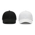 Ai generated image of two blank baseball caps, black and white, side-by-side for product mockup. isolated on white background Royalty Free Stock Photo