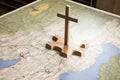 Wooden cross on the map of the world. Conceptual image of Missionary work