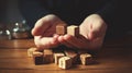 Wooden letter cubes holding hands, spelling connection and unity.