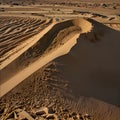Large Sand Dune with Wind Ripples Under a Bright Sky Royalty Free Stock Photo
