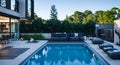 Ai generated a luxurious outdoor living space featuring a stunning pool Royalty Free Stock Photo