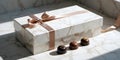Elegant Marble Pattern Gift Box With Satin Ribbon And Gourmet Chocolates In Soft Daylight Royalty Free Stock Photo