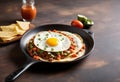 mexican breakfast with fried egg in a skillet Royalty Free Stock Photo
