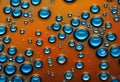 AI-generated multi-colored droplets create a beautiful background.