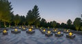 Ai generated multiple fire pits in a park, surrounded by trees and nature