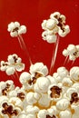 Popcorn Explosion Illustration With Dynamic Motion And Bold Red Background Royalty Free Stock Photo