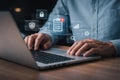 AI generated professional hands typing on laptop with floating digital security and system icons representing data protection Royalty Free Stock Photo