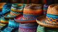 Rows of bright, patterned sombreros on display, embodying Mexican festive spirit.