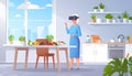 AI generated: Senior citizen enjoying virtual reality cooking class. Royalty Free Stock Photo