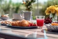 Breakfast in the garden. Milk, fruits, bread, berries on a wooden table.