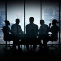 AI-Generated Silhouette of People Around a Conference Table at Sunset Royalty Free Stock Photo