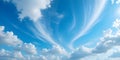 Blue Sky With Soft White Clouds And Delicate Feather-Like Cirrus Shapes Creating Dreamy Atmosphere Royalty Free Stock Photo