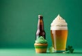 st patricks day cupcake and beer on green background Royalty Free Stock Photo
