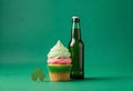 st patricks day cupcake and beer on green background Royalty Free Stock Photo