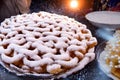 AI-generated tart with sugar powder on it
