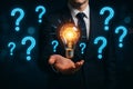 AI generated ultra realistic business concept with glowing light bulb and blue question marks representing idea search problem Royalty Free Stock Photo