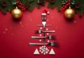 AI generated. Festive Cutlery Christmas Tree with Santa Hat on Red Background Royalty Free Stock Photo