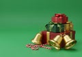 AI generated. Festive Christmas Gifts Stack with Golden Bells on Green Background Royalty Free Stock Photo