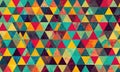A colorful pattern of triangles is displayed on a wall. Royalty Free Stock Photo