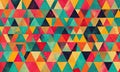 A colorful pattern of triangles is displayed on a wall. Royalty Free Stock Photo