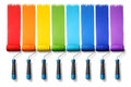 Colorful Paint Rollers Creating Rainbow Wall Strokes For Creative Design Concepts Royalty Free Stock Photo